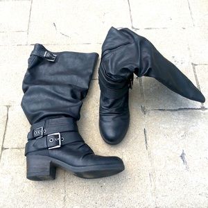 Tall, black heeled boots; good condition.